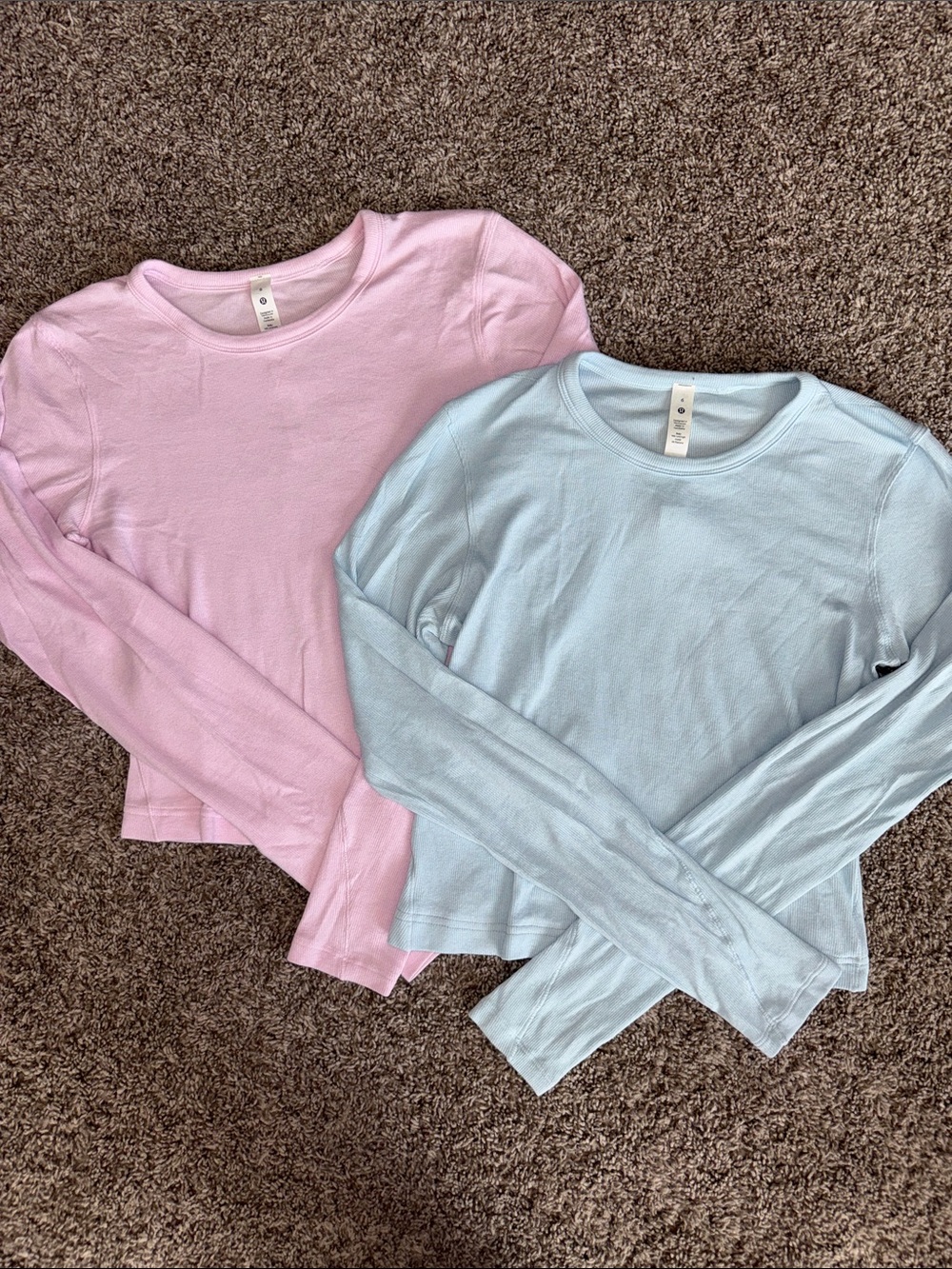 Two Lululemon hold tight long sleeve shirts 6